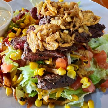 Beef 'O' Brady's - Cowboy Steak Salad includes a sliced 6oz Sirloin and is excellent! - Pubs Near Me - Sebring, Florida