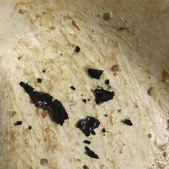 Chipotle Mexican Grill - Nasty burnt black object in my chicken bowl. Looked like charcoal or some sort of burnt plastic. It fell apart and into pieces. - Mexican Near Me - Brooklyn, New York