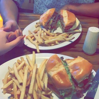 Hurricane Grill & Wings - Hangover Burger Natural Cut Fries Bacon Guacamole Burger Natural Cut Fries - Chicken Wings Near Me - Fort Pierce, Florida