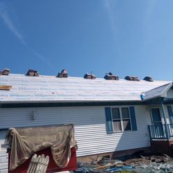 JR's Roofing and Gutters - Roof torn off completely, new synthetic underlayment and drip edge installed.  Shingles loaded for installation.