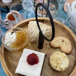 Miss Ashley's Tearoom & Cafe - The dessert tray with an assortment of goodies! Of course, sticking to tradition with a scone also!