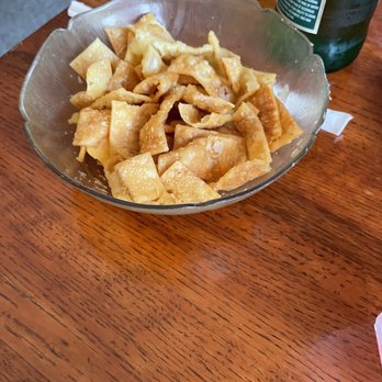 Mah Jong Chinese Restaurant - a bowl of chips on a table - Chinese Near Me - Snellville, Georgia Mah Jong Chinese Restaurant - a bowl of chips on a table - Chinese Near Me - Snellville, Georgia