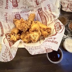30 Burgers - Chicken wings with teriyaki sauce, honey bbq sauce