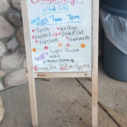 Covered Wagon Restaurant - A list of the day's specials by the entrance.