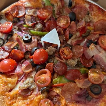 Slice House by Tony Gemignani - The combo! All sorts of meats, onions, and cherry tomatoes that just adds a burst of freshness! - Pizza Near Me - Eastvale, California