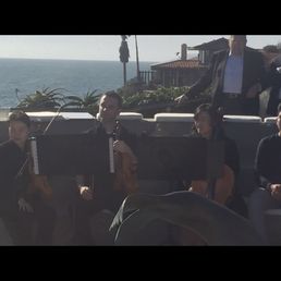 During the ceremony (sun was on everyone's face). At least there was a nice ocean breeze.