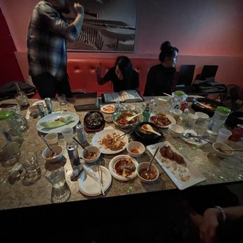 Green Light Korean Pub & Karaoke - a table full of food - Korean Near Me - Chicago, Illinois Green Light Korean Pub & Karaoke - a table full of food - Korean Near Me - Chicago, Illinois