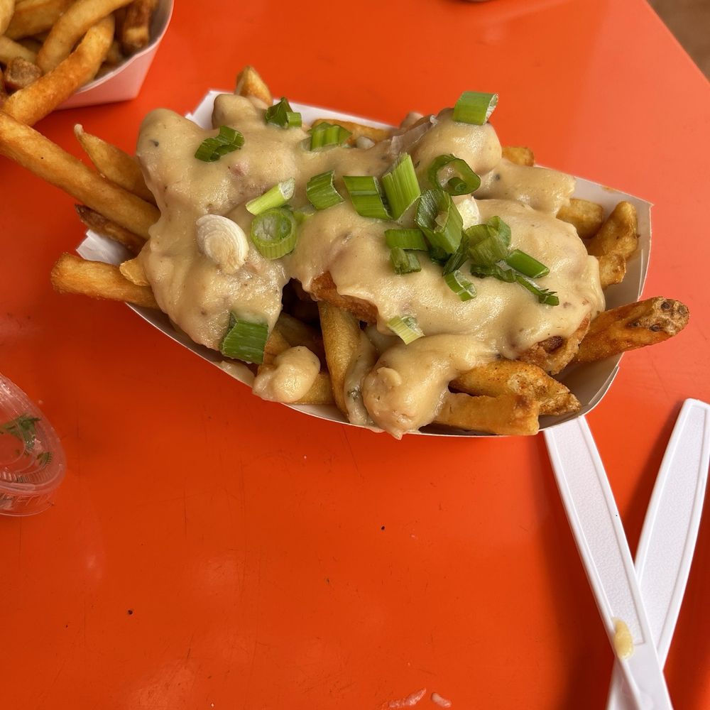 Tiki Grill - Pork belly poutine (fries and cheese curds covered in pork belly gravy) - Comfort Food Near Me - Flagstaff, Arizona Tiki Grill - Pork belly poutine (fries and cheese curds covered in pork belly gravy) - Comfort Food Near Me - Flagstaff, Arizona