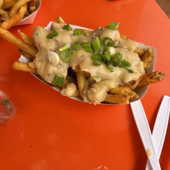 Tiki Grill - Pork belly poutine (fries and cheese curds covered in pork belly gravy) - Comfort Food Near Me - Flagstaff, Arizona Tiki Grill - Pork belly poutine (fries and cheese curds covered in pork belly gravy) - Comfort Food Near Me - Flagstaff, Arizona