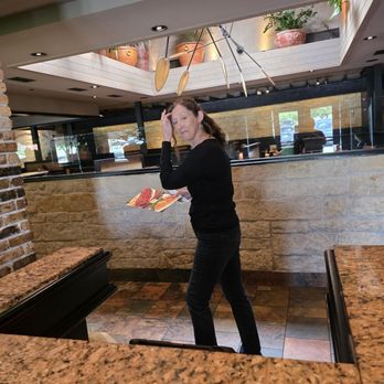Cheddar's Scratch Kitchen - The hostess leading me to my booth. - Comfort Food Near Me - Roanoke, Virginia Cheddar's Scratch Kitchen - The hostess leading me to my booth. - Comfort Food Near Me - Roanoke, Virginia