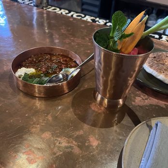 Meesh Meesh - From the shefha: chamutzim, herbs & veggies (in the cup) and then matbucha and labneh - Tapas/Small Plates Near Me - Louisville, Kentucky Meesh Meesh - From the shefha: chamutzim, herbs & veggies (in the cup) and then matbucha and labneh - Tapas/Small Plates Near Me - Louisville, Kentucky