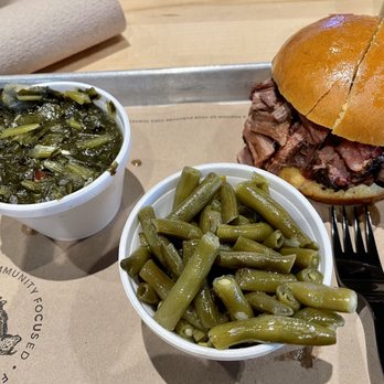 4 Rivers Smokehouse - Brisket sandwich on a potato bun with collard greens and green beans - Smokehouse Near Me - Tallahassee, Florida 4 Rivers Smokehouse - Brisket sandwich on a potato bun with collard greens and green beans - Smokehouse Near Me - Tallahassee, Florida