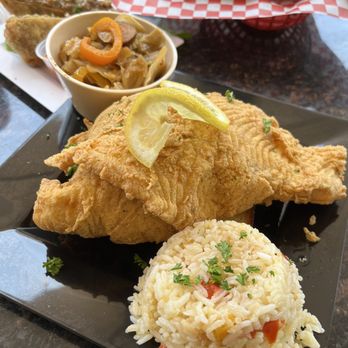 Aunt E’s Southern Cuisine - Cabbage, seasoned rice & fried white fish - Chicken Wings Near Me - Greensboro, North Carolina Aunt E’s Southern Cuisine - Cabbage, seasoned rice & fried white fish - Chicken Wings Near Me - Greensboro, North Carolina