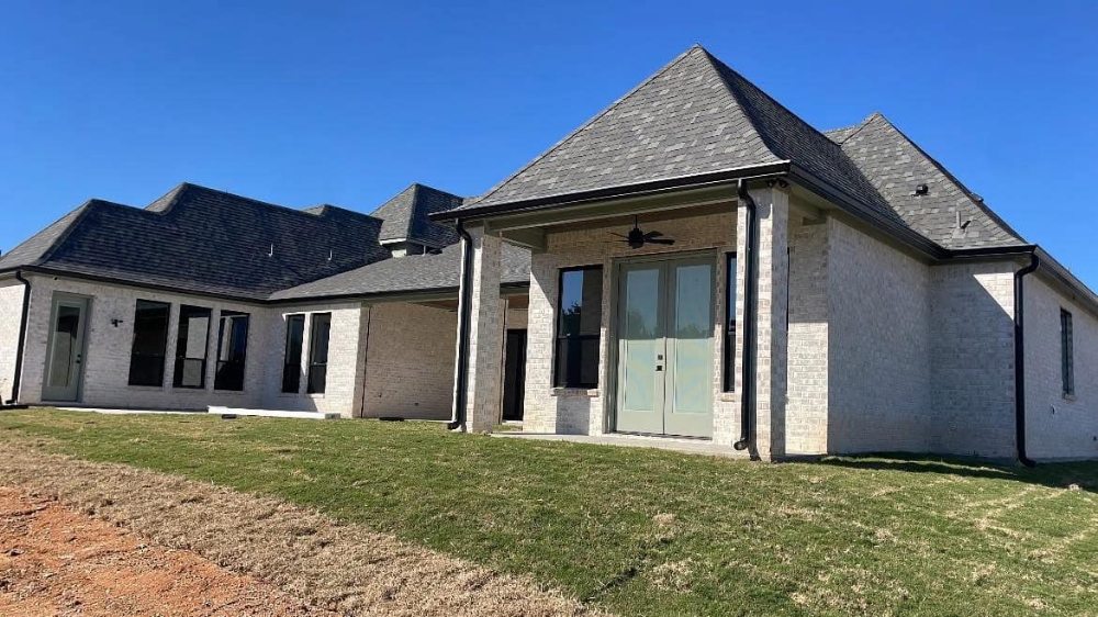 Slide of Triple GGG's Seamless Gutters