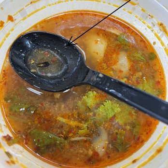Thai Cottage Westheimer - a spoon in a bowl of soup - Thai Near Me - Houston, Texas Thai Cottage Westheimer - a spoon in a bowl of soup - Thai Near Me - Houston, Texas
