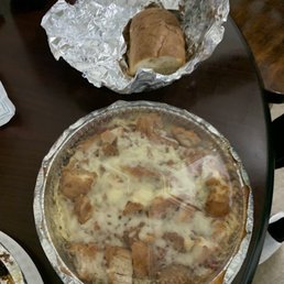 Chicken parm with spaghetti and garlic bread