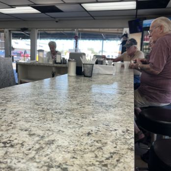 Town View Cafe - Lots of counter space when eating with the pros. There is two booth tables if you don't feel like rubbing elbows - Donuts Near Me - Belle Chasse, Louisiana Town View Cafe - Lots of counter space when eating with the pros. There is two booth tables if you don't feel like rubbing elbows - Donuts Near Me - Belle Chasse, Louisiana