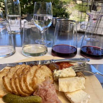 Niner Wine Estates - Tasting flight and charcuterie board plate - Wine Tasting Room Near Me - Paso Robles, California Niner Wine Estates - Tasting flight and charcuterie board plate - Wine Tasting Room Near Me - Paso Robles, California
