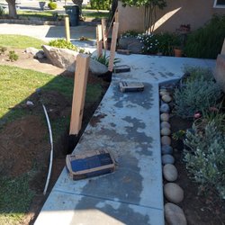 Eco Balance Landscaping - Build small privacy fence and painted black