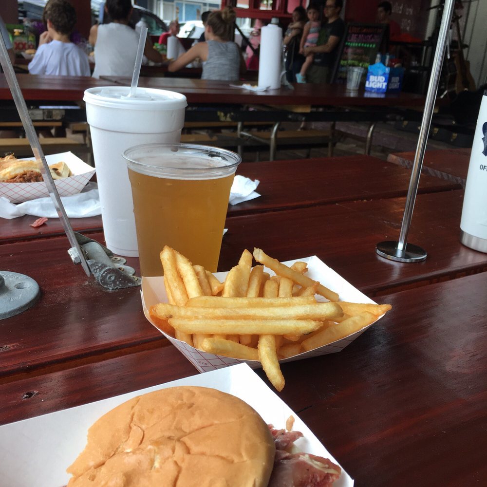 The Loose Caboose - Turkey leg sandwich and Saint Arnold Summer Pilser - Barbeque Near Me - Spring, Texas