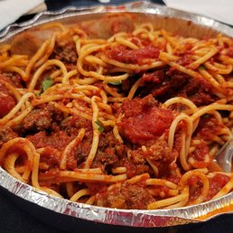 a bowl of spaghetti and meat a bowl of spaghetti and meat