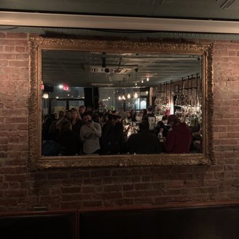 Subject - The mirror adds depth to a rather small bar space - Cocktail Bars Near Me - New York, New York