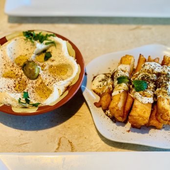 Tanoor - Hummus and cheese fries. Included in the mixed grill for 2-3 - Lebanese Near Me - Sammamish, Washington Tanoor - Hummus and cheese fries. Included in the mixed grill for 2-3 - Lebanese Near Me - Sammamish, Washington