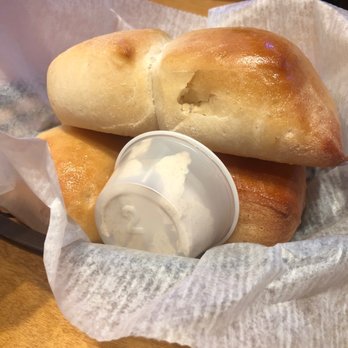 Texas Roadhouse - a basket of bread and a bottle of ketchup - Steakhouses Near Me - Kingsport, Tennessee