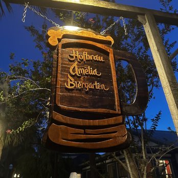 Hofbrau Amelia - a beer mug hanging from a wooden sign - German Near Me - Fernandina Beach, Florida Hofbrau Amelia - a beer mug hanging from a wooden sign - German Near Me - Fernandina Beach, Florida