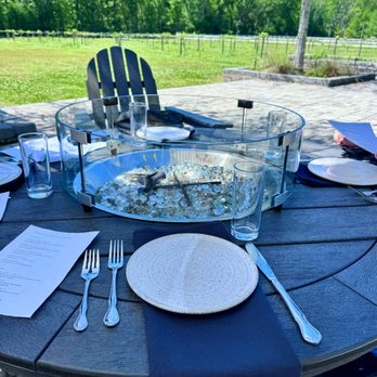 Congaree and Penn - Outdoor fire table during the day. Set for fine dining. Feels like fine dining - Farms Near Me - Jacksonville, Florida Congaree and Penn - Outdoor fire table during the day. Set for fine dining. Feels like fine dining - Farms Near Me - Jacksonville, Florida