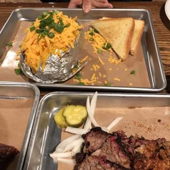 Tender Smokehouse - Loaded Baked Potato and some beef brisket. Their sweet onions and pickles were a nice add on! - Barbeque Near Me - Celina, Texas Tender Smokehouse - Loaded Baked Potato and some beef brisket. Their sweet onions and pickles were a nice add on! - Barbeque Near Me - Celina, Texas