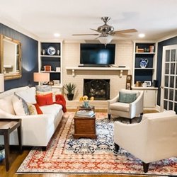 Organizing ETC - Transformation of this den from a bland beige room to one with rich blue walls, a new sofa, and existing rug and chairs.