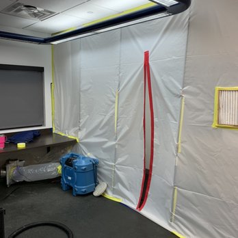 Bravo Environment - Set up containment for mold removal at a office after hours. - Damage Restoration Near Me Bravo Environment - Set up containment for mold removal at a office after hours. - Damage Restoration Near Me