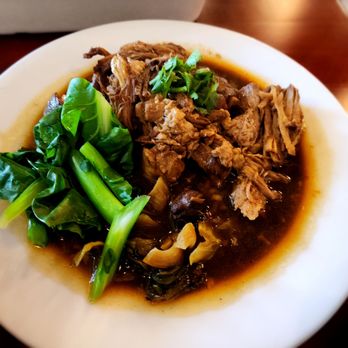 Thai Cottage Bistro - Kao Kha Moo Pork Leg Stewed with Assorted Herbs, Chinese Broccoli, Pickled Mustard Green,| Cilantro. Served With A Side Of Jasmine Rice - Thai Near Me - Rockville, Maryland