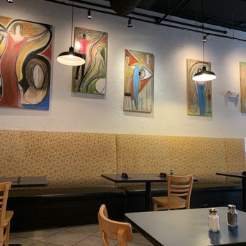 Luigi's Pizzeria - a dining area with tables and chairs - Pizza Near Me - Louisville, Kentucky Luigi's Pizzeria - a dining area with tables and chairs - Pizza Near Me - Louisville, Kentucky