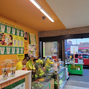 Apple house - a woman standing at the counter - Fruits & Veggies Near Me - New York, New York Apple house - a woman standing at the counter - Fruits & Veggies Near Me - New York, New York
