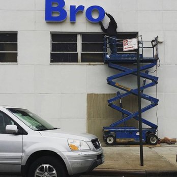 Nie Electric - Installing new LED signs in Bronx Honda - Electricians Near Me