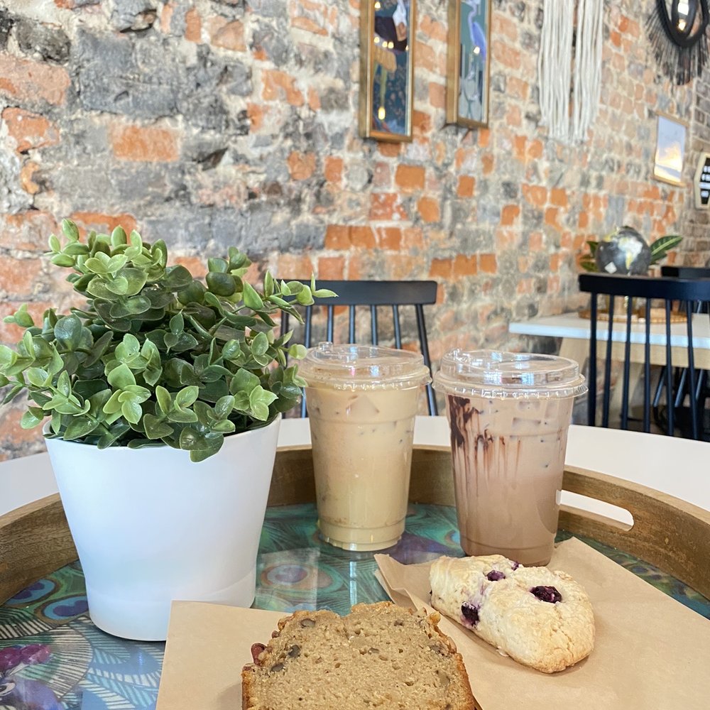 Maroon Monkey Coffee - Banana foster iced latte, S'mores iced latte, banana bread, and blueberry scone. - Coffee & Tea Near Me - Wilmington, North Carolina Maroon Monkey Coffee - Banana foster iced latte, S'mores iced latte, banana bread, and blueberry scone. - Coffee & Tea Near Me - Wilmington, North Carolina
