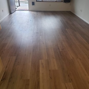 All Surfaces - a hardwood floor in a living room - Flooring Near Me - Portland, Oregon