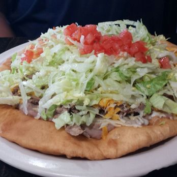 Abuelita's New Mexican Restaurant - Navajo taco being its own mondo self. - New Mexican Cuisine Near Me - Bernalillo, New Mexico Abuelita's New Mexican Restaurant - Navajo taco being its own mondo self. - New Mexican Cuisine Near Me - Bernalillo, New Mexico