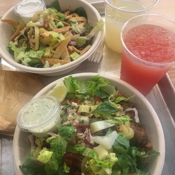 CAVA - Greens and grains bowls! Top: yogurt dill dressing + lemonade. Bottom: lemon herb tahini dressing + watermelon and lime - Mediterranean Near Me - Pasadena, California