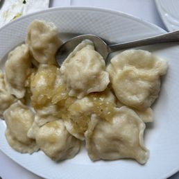 Boiled pierogis filled with potatoes and cheese. They were huge and tasty. Boiled pierogis filled with potatoes and cheese. They were huge and tasty.