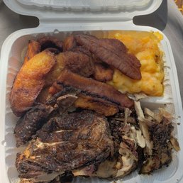 Jerk Chicken, Mac and cheese, and fried plantains Jerk Chicken, Mac and cheese, and fried plantains