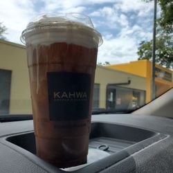 Large iced coffee with blueberry foam