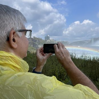 Journey Behind the Falls - Miro taking a pic of the American falls and rainbow - Tours Near Me - Niagara Falls, Ontario Journey Behind the Falls - Miro taking a pic of the American falls and rainbow - Tours Near Me - Niagara Falls, Ontario