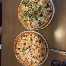 veggie pizza and grecian pizza with sausages veggie pizza and grecian pizza with sausages