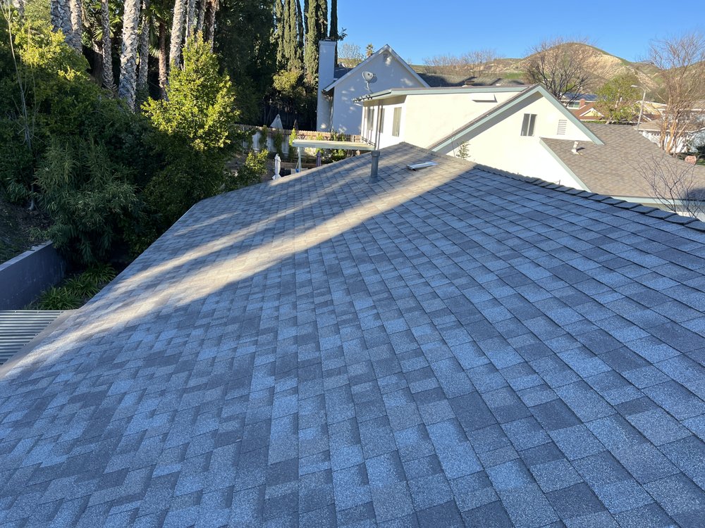 Slide of JW Roofing Services