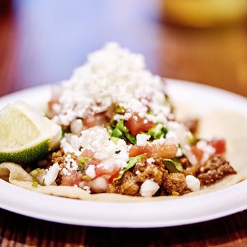 Bajo Taco - a plate of food on a table - Mexican Near Me - Nashville, Tennessee Bajo Taco - a plate of food on a table - Mexican Near Me - Nashville, Tennessee