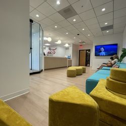 Little House of Smiles - Ample , new seating in the waiting room. So plush and comfy too!