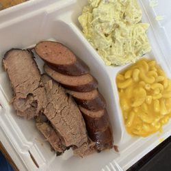 Daily special two meat lean brisket with regular sausage potato salad and Mac and cheese
